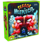 Brikker og biler skal knipses hen over brættet i Terror in Meeple Town